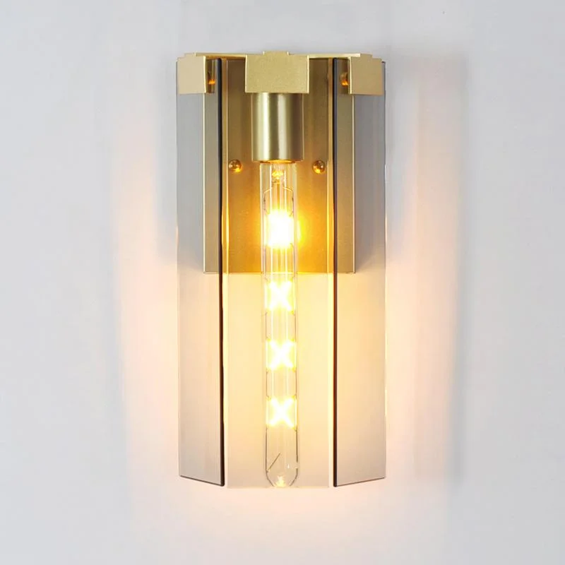 golden sconce with glass shade